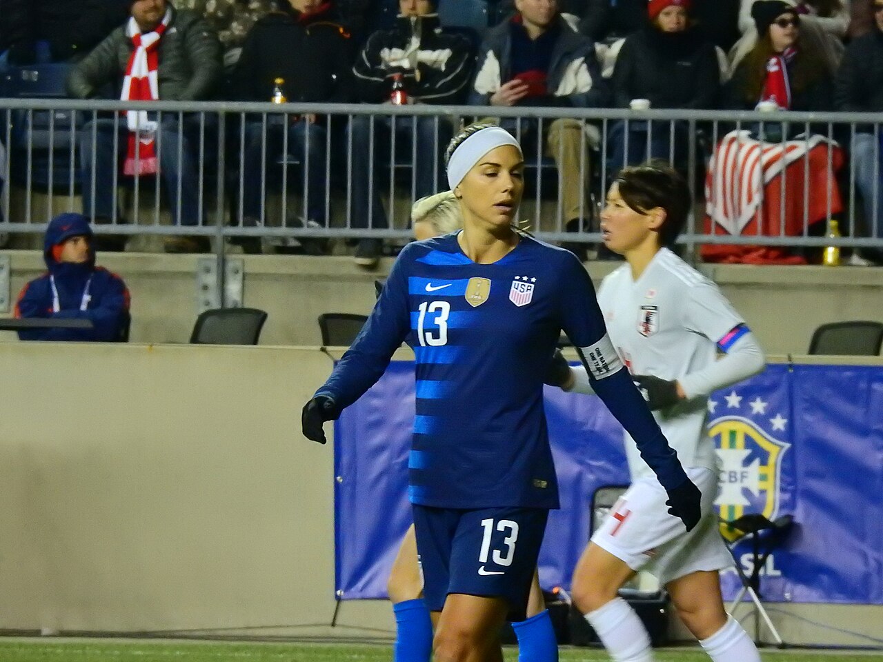 A player wearing the captain's armband on her upper arm during a match