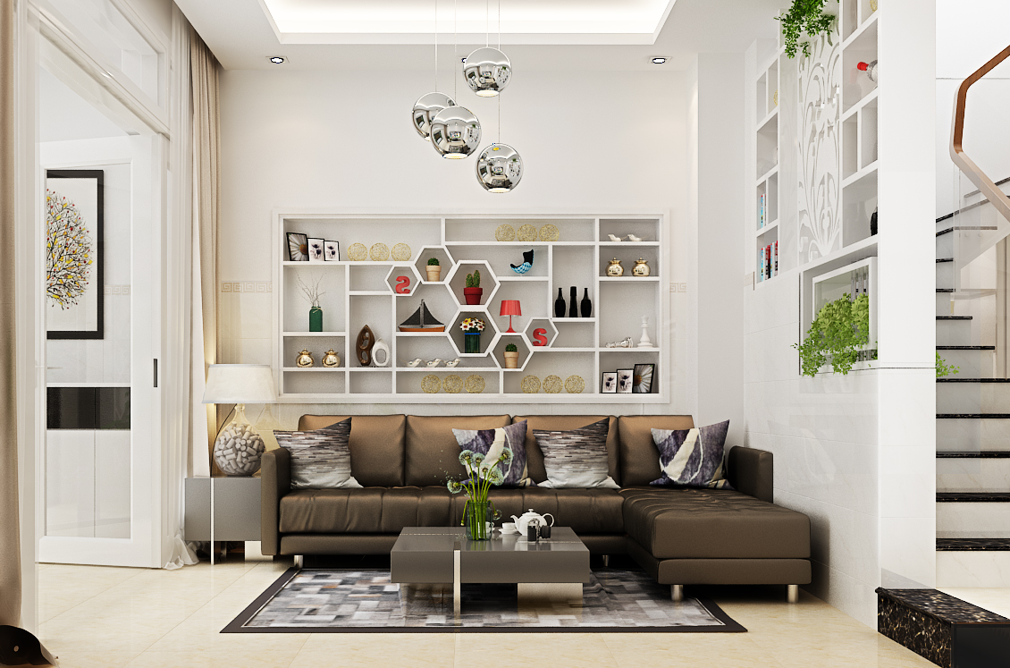 A modern living room with a sofa and cushions, a coffee table on a rug, wall shelves with houseplants, and a floor lamp